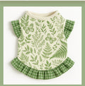 Cute ruffled pet dress with floral meadow print in green and beige.