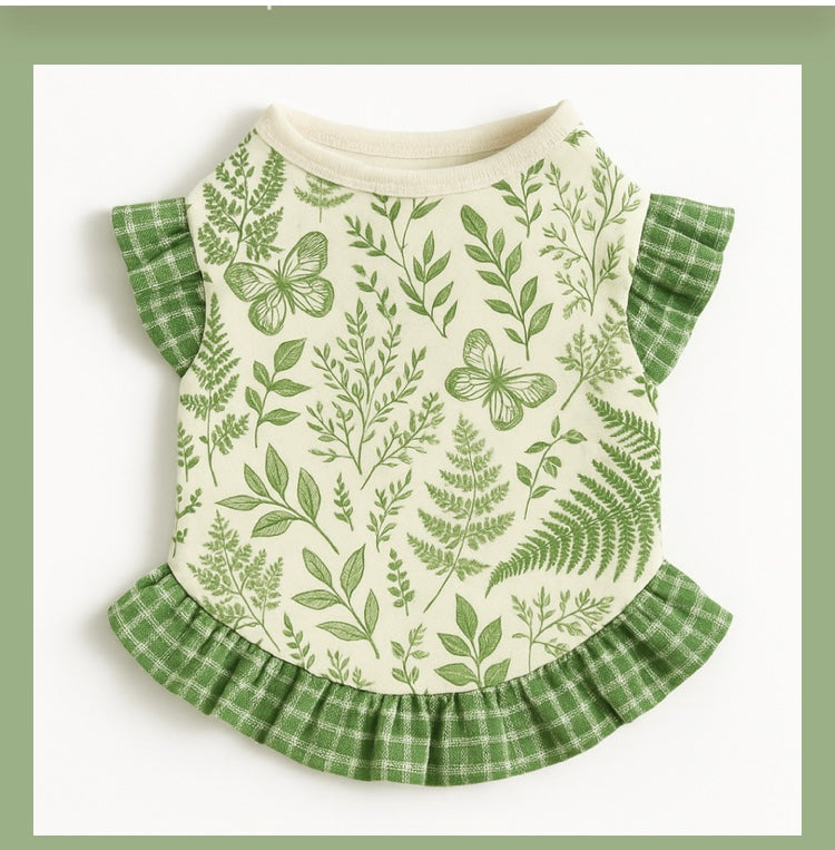Cute ruffled pet dress with floral meadow print in green and beige.